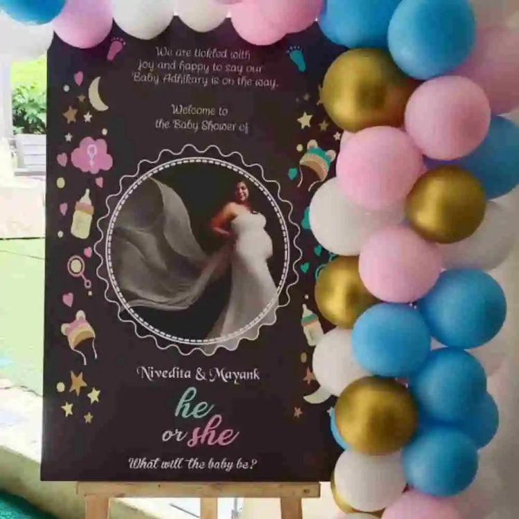 Wooden baby shower decor with half arch and backdrop