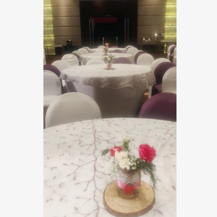 Order Berry First Birthday Decor with strawberry-themed floral table centrepieces