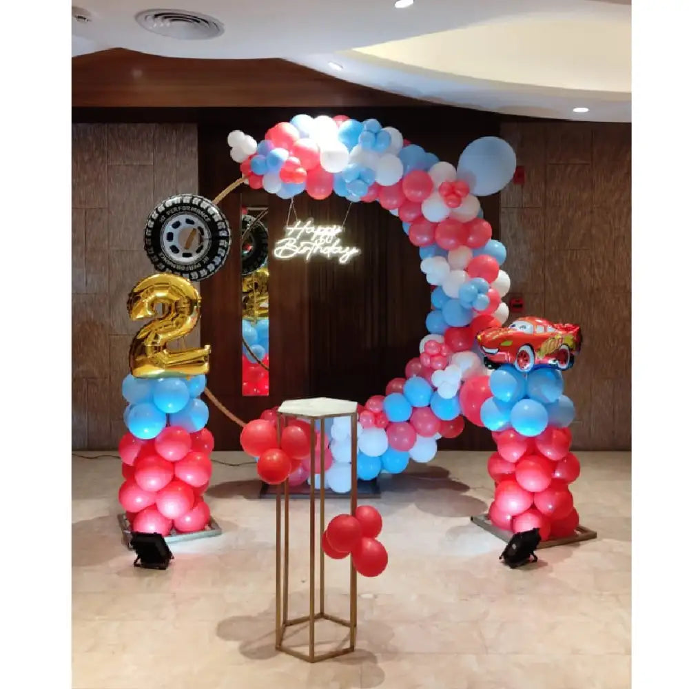 Car theme balloon decoration with birthday balloon arch design