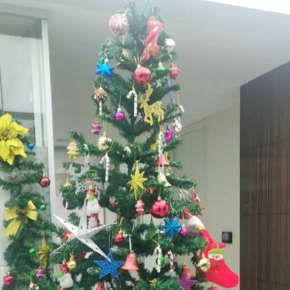 Book Christmas tree decoration for office with festive ornaments and lights