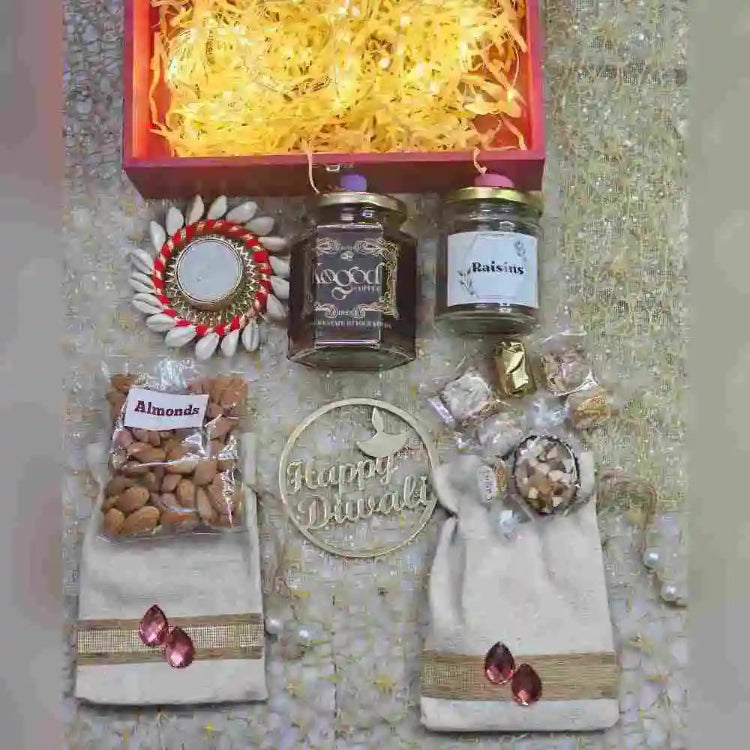 Shop Diwali festive sparkle hamper with almonds, raisins and decorative gift box