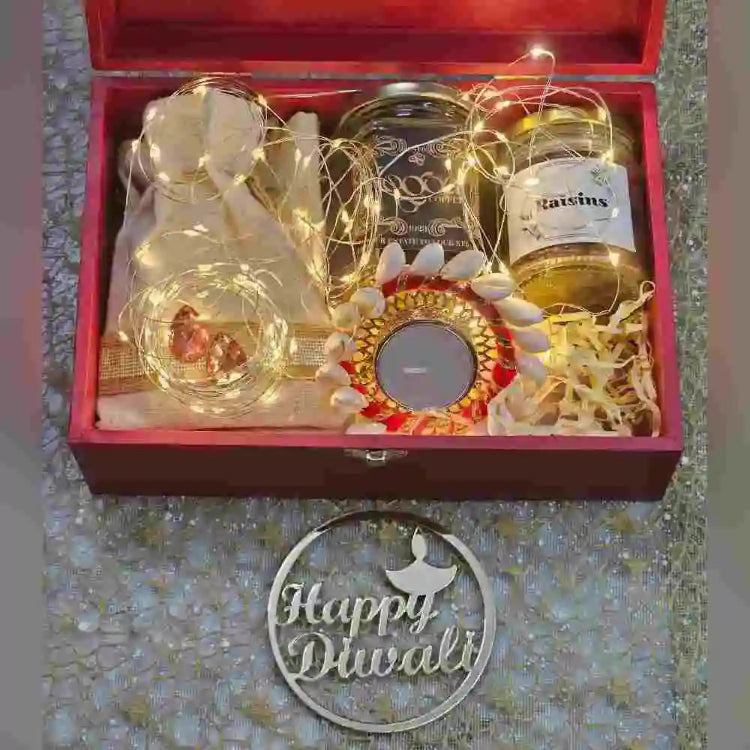 Buy Diwali dry fruit gift hamper with decorative light and candle