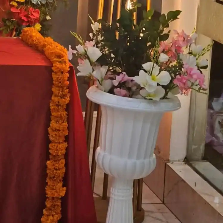 Book Ganesh Chaturthi floral pot decoration for festive event spaces