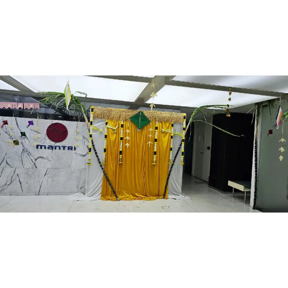 Book Gold Pongal office decoration with traditional backdrop and hanging decor