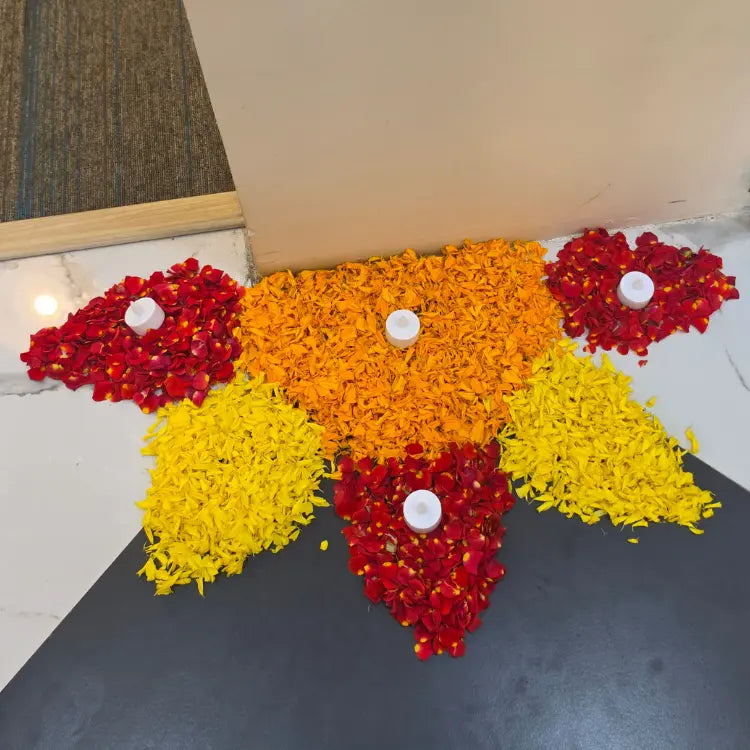 Book Onam Floral Rangoli Decor with Traditional Diya Arrangement