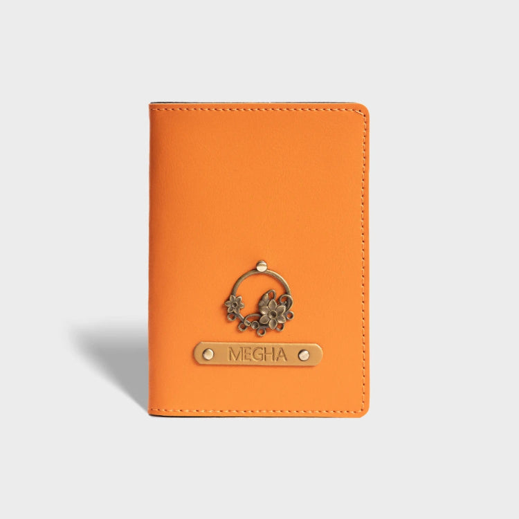 Shop orange personalized passport cover with floral charm and name