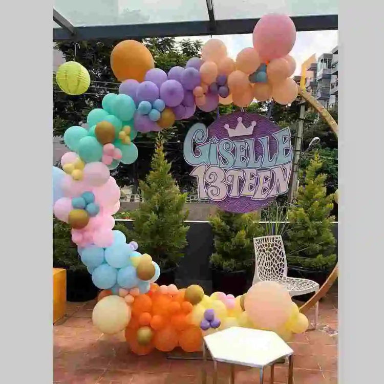 book-pastel multicolour birthday balloon arch with backdrop