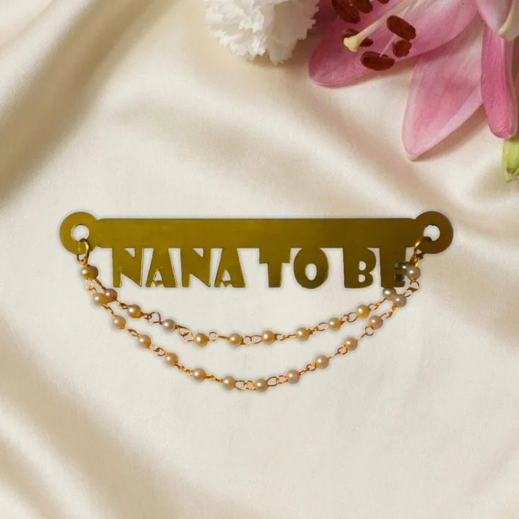 Order personalized baby shower badge with Nana to Be gold pearl design