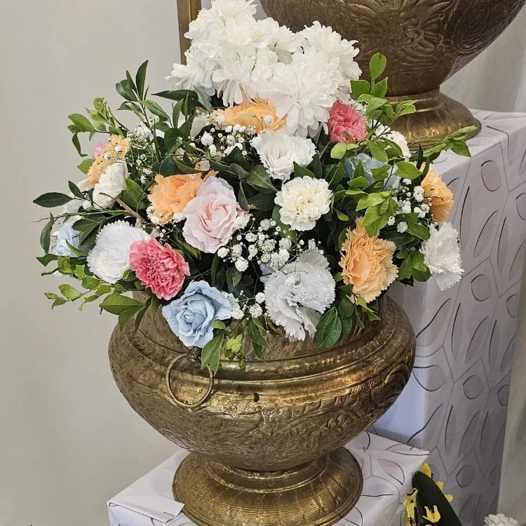 Book traditional and modern floral decoration with brass vase arrangement