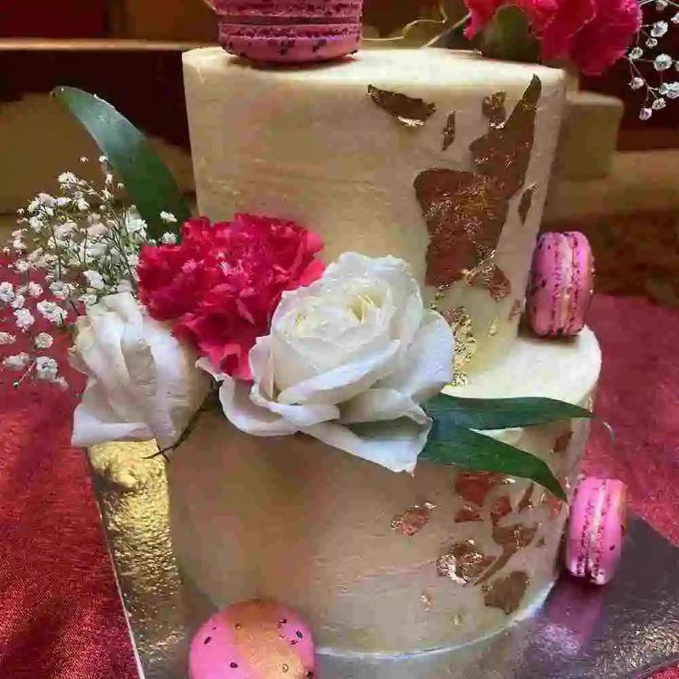 Order Two tier wedding cake with buttercream frosting and floral decor