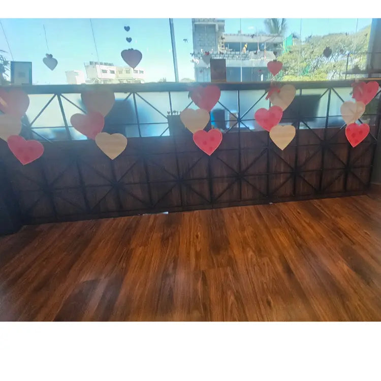 Enquire about Valentine's Day balcony decoration with suspended heart decor