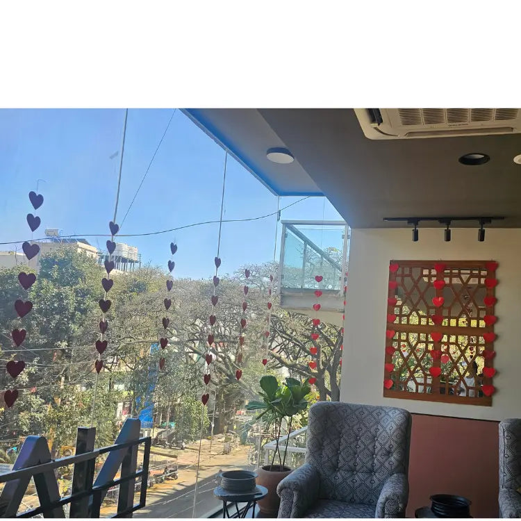Book Valentine's Day restaurant decoration with hanging heart cutouts
